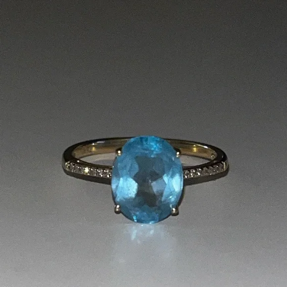 Blue Topaz yellow gold 10k ring with diamonds
